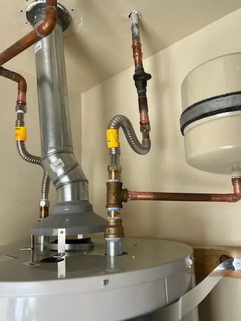 Water heater installation and plumbing repair in Whitlock